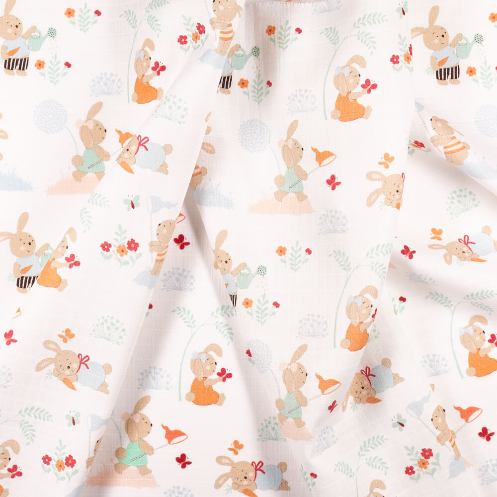 IC008 Muslin 100% Cotton Fabric White / Mlt Rabbits In Garden Softened